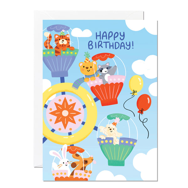 A children's birthday card with animals on the ferris wheel.