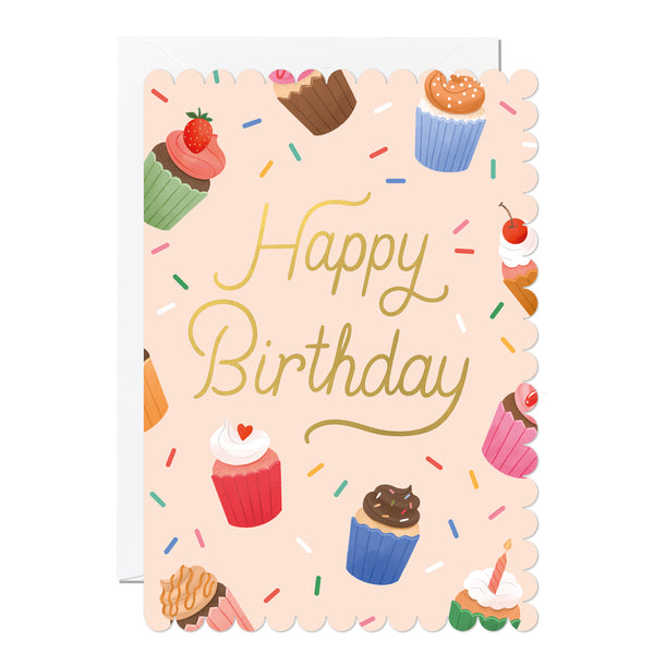 Birthday card with colourful cupcakes and the text 'Happy Birthday' on a light pink background