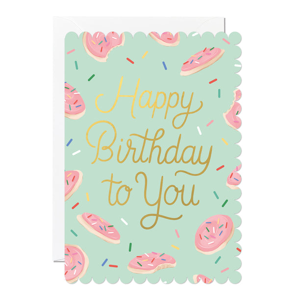 Birthday card with 'Happy Birthday to You' text and sugar cookie illustrations on a light green background