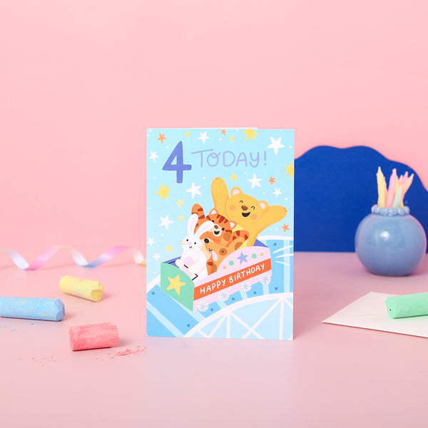 A colourful birthday card featuring an illustration of a teddy bear and a rabbit on a rollercoaster with stars and the number 4, indicating it's a 4th birthday card.