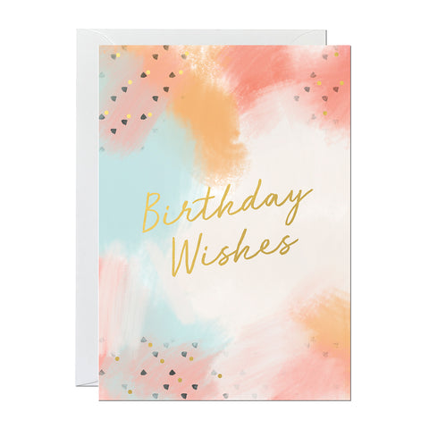 A birthday card featuring a hand-painted background and a gold foil greeting that reads 'birthday wishes'