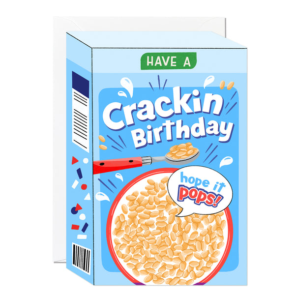 A die-cut greeting card featuring a puffed rice cereal box design on a bright blue background with a breakfast bowl and a 'hope it pops!' speech bubble.
