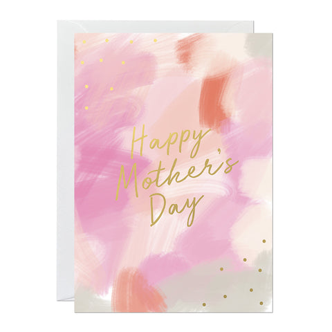 A mother's day card featuring a hand-painted canvas background and gold foil lettering that says 'happy mother's day'