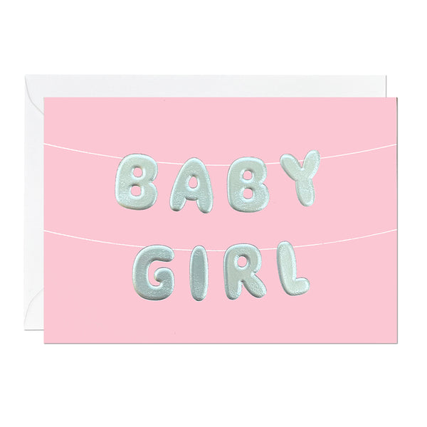 A pink baby girl greeting card featuring letter bunting printed with an embossed foil