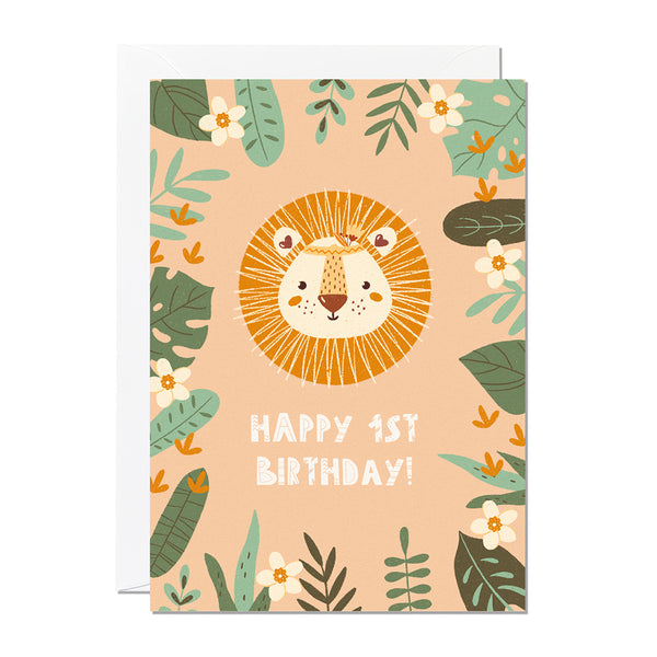 A children's 1st birthday card with the greeting 'happy 1st birthday' featuring an illustration of a lion with jungle foliage around the border
