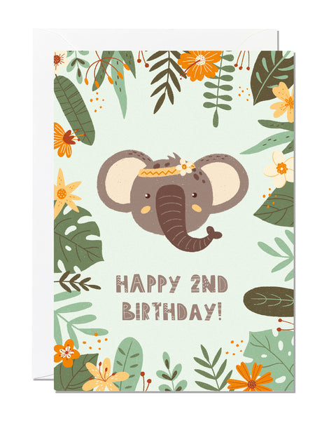 A children's 2nd birthday card with the greeting 'happy 2nd birthday' featuring an illustration of an elephant with jungle foliage around the border