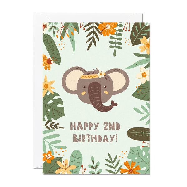 A children's 2nd birthday card with the greeting 'happy 2nd birthday' featuring an illustration of an elephant with jungle foliage around the border