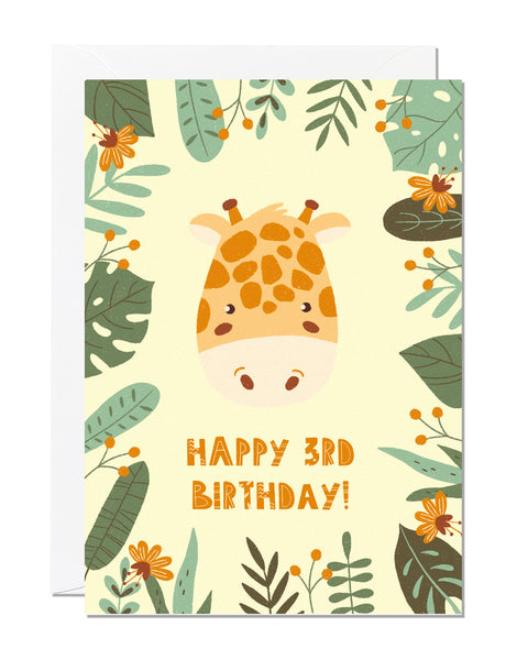 A children's 3rd birthday card with the greeting 'happy 3rd birthday' featuring an illustration of a giraffe with jungle foliage around the border