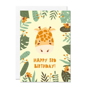 A children's 3rd birthday card with the greeting 'happy 3rd birthday' featuring an illustration of a giraffe with jungle foliage around the border