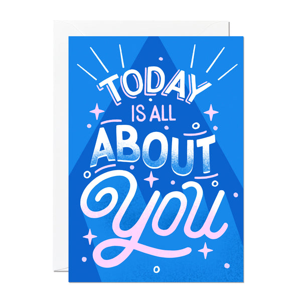 This greeting card features hand-lettering and says 'today is all about you' and is the perfect birthday or wedding card. It's set against a bright and bold blue background and printed in England.