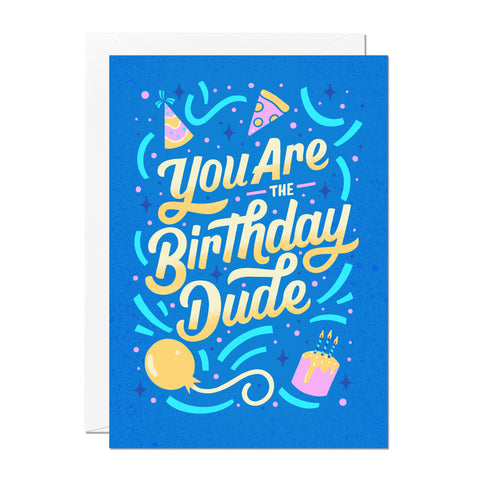 This birthday card is perfect for him or a teenagers and reads 'you are the birthday dude'. It features hand lettering and illustrations of birthday cakes, birthday balloons and pizza, perfect for a party!